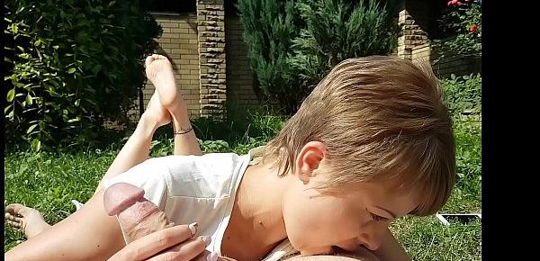  Pretty milf sucks him off with showing her little sexy soles in the yard